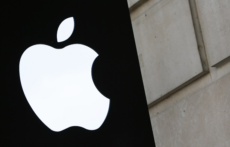 A picture shows the Apple logo outside the Apple store in Covent Garden in London August 30, 2016. The European Commission's demand for Apple to pay Ireland some 13 billion euros in back taxes has put the country in the strange position of refusing the windfall for fear of scaring away valuable investment. Rather than welcoming the cash -- equivalent to around five percent of its gross domestic product -- the government has vowed to appeal the ruling, fearing an ever greatest cost to its economy and jobs.  / AFP PHOTO / DANIEL LEAL-OLIVAS