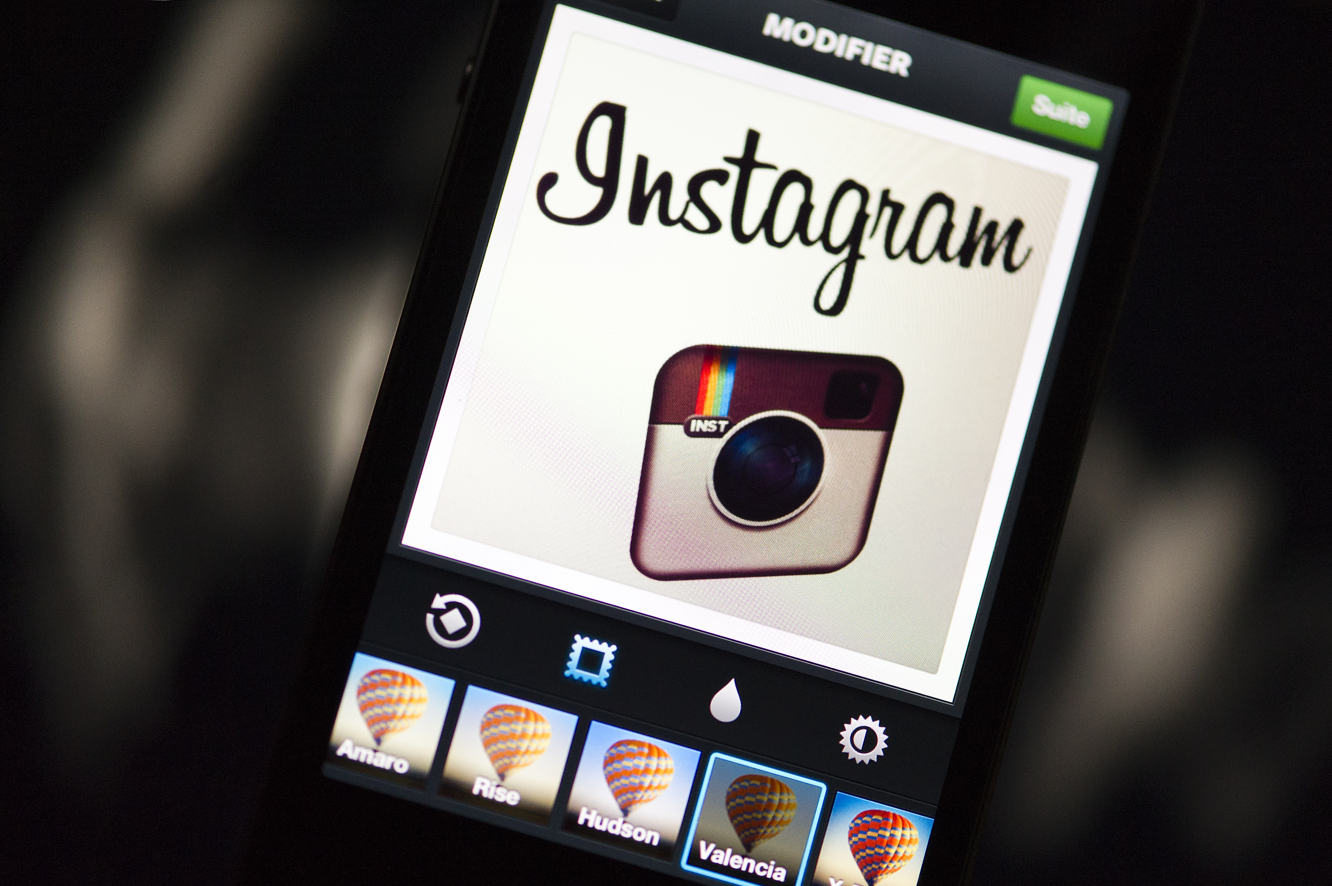 The Instagram logo is displayed on a smartphone on December 20, 2012 in Paris. Instagram backed down on December 18, 2012 from a planned policy change that appeared to clear the way for the mobile photo sharing service to sell pictures without compensation, after users cried foul. Changes to the Instagram privacy policy and terms of service set to take effect January 16 had included wording that appeared to allow people's pictures to be used by advertisers at Instagram or Facebook worldwide, royalty-free.   AFP PHOTO / LIONEL BONAVENTURE / AFP PHOTO / LIONEL BONAVENTURE