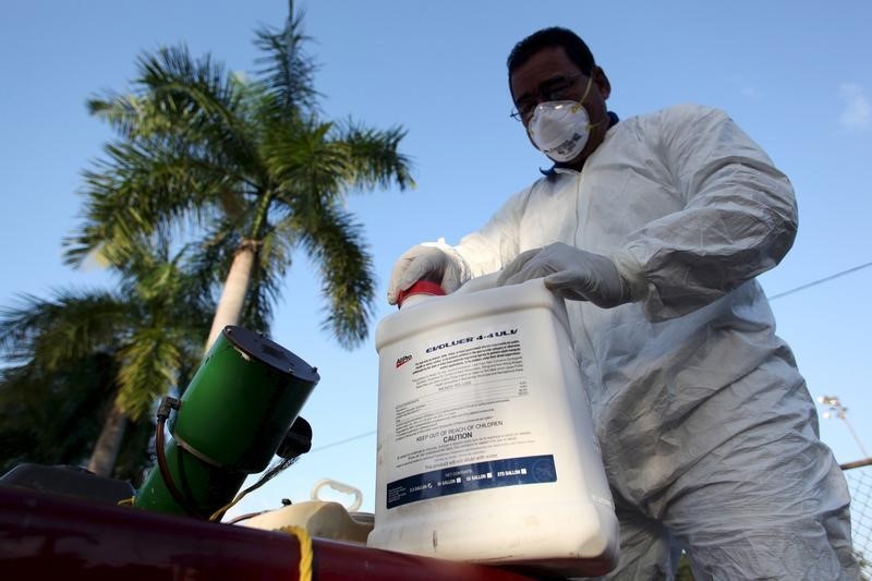 A health worker prepares insecticide before fumigating a neighborhood in San Juan, in this January 27, 2016, file photo. REUTERS/Alvin Baez/Files