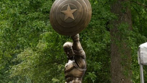 A bronze Captain America statue debuts in Brooklyn's Prospect Park to celebrate the character's 75th anniversary.(photo grabbed from Reuters video) 