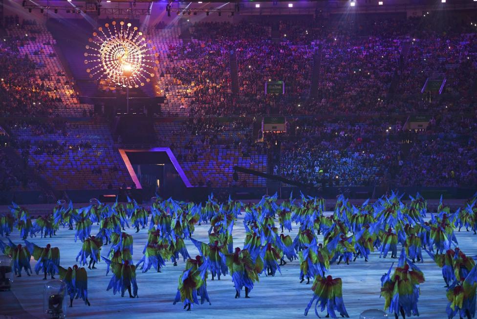 Performers take part in the closing ceremony. REUTERS/Toby Melville
