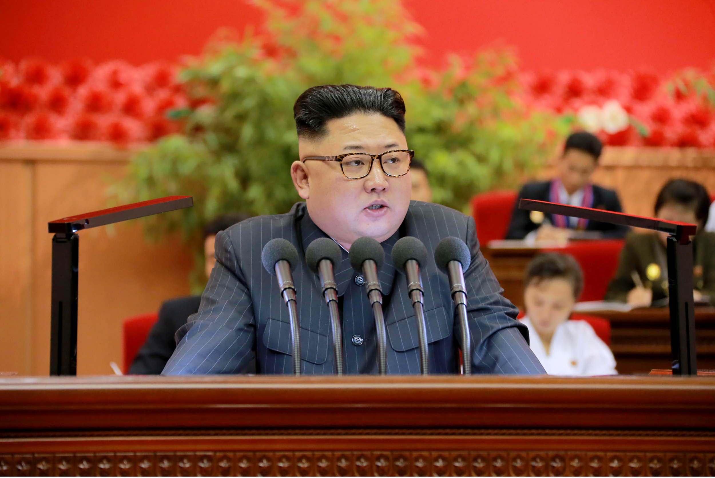 This recent picture released by North Korea's official Korean Central News Agency (KCNA) on August 29, 2016 shows North Korean leader Kim Jong-Un dellivering his speech during the 9th Congress of the Kim Il-Sung Socialist Youth League which held in Pyongyang on August 27 and 28, 2016. / AFP PHOTO / KCNA / KNS