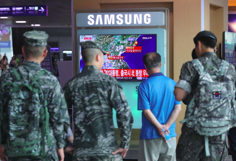 South Korean soldiers watch a television broadcast reporting on North Korea's latest nuclear test, at a railway station in Seoul on September 9, 2016. North Korea claimed on September 9 it had successfully tested a nuclear warhead that could be mounted on a missile, drawing condemnation from the South over the "maniacal recklessness" of young ruler Kim Jong-Un. / AFP PHOTO / YONHAP / STR /  - South Korea OUT / REPUBLIC OF KOREA OUT  NO ARCHIVES  RESTRICTED TO SUBSCRIPTION USE