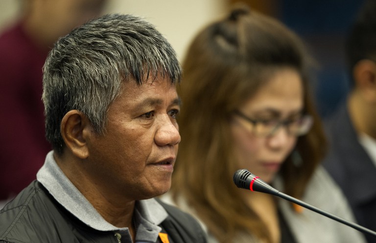 Former death squad member Edgar Matobato testifies during a senate hearing in Manila on September 15, 2016. / AFP PHOTO / NOEL CELIS