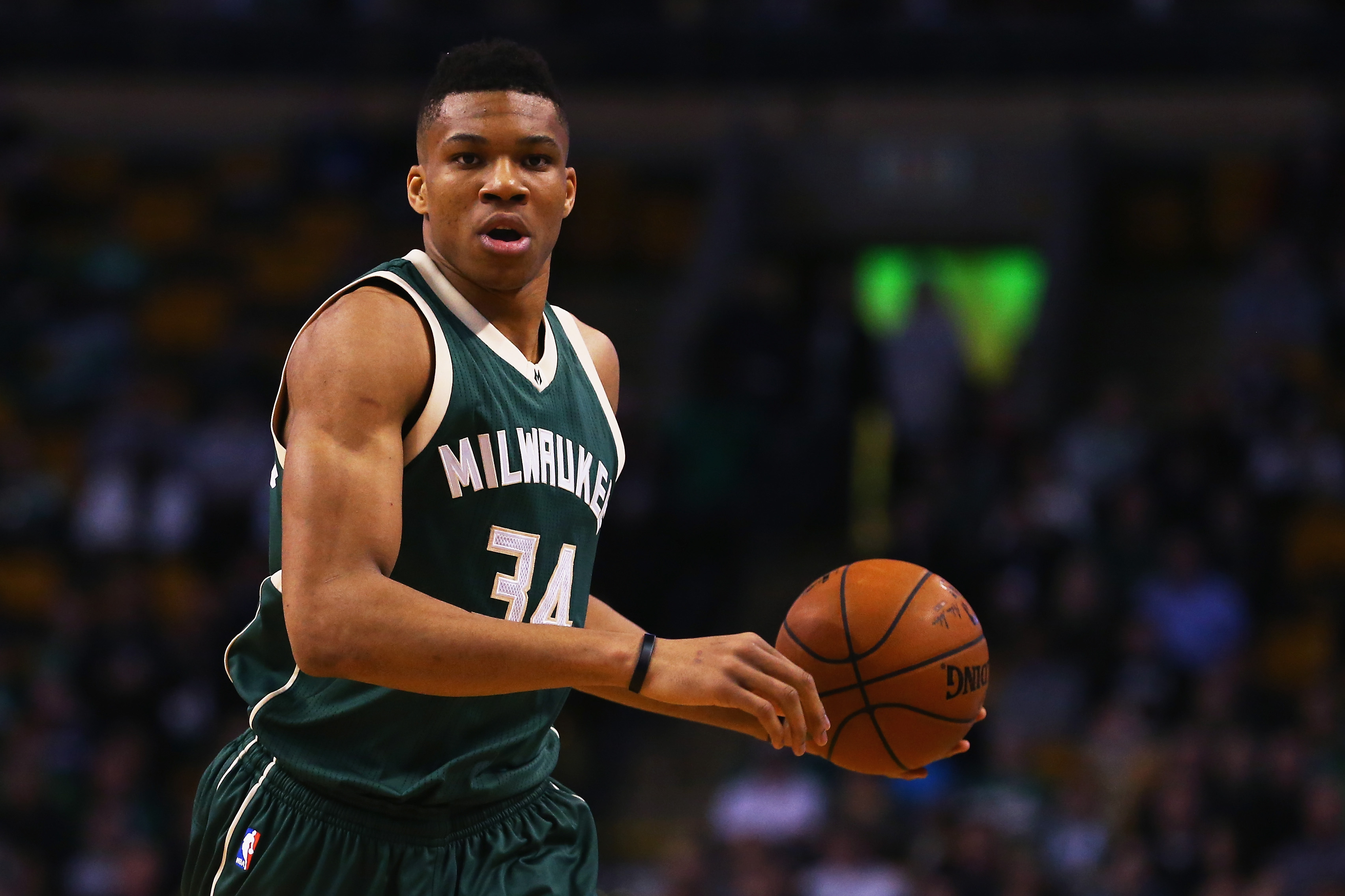 BOSTON, MA - FEBRUARY 25: Giannis Antetokounmpo #34 of the Milwaukee Bucks carries the ball against the Boston Celtics during the first quarter at TD Garden on February 25, 2016 in Boston, Massachusetts.   Maddie Meyer/Getty Images/AFP