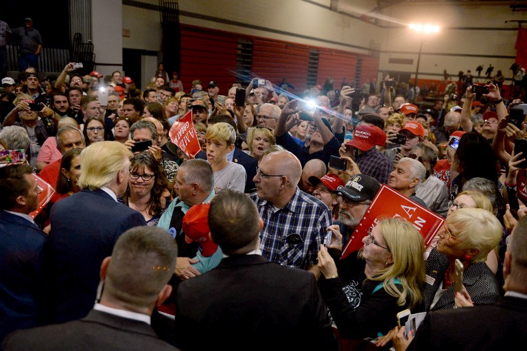 LACONIA, NH - SEPTEMBER 15: Republican Presidential nominee Donald Trump works the rope line after speaking at Laconia Middle School September 15, 2016 in Laconia, New Hampshire. Trump is in a tight race with Hillary Clinton as the November election nears. Darren McCollester/Getty Images/AFP