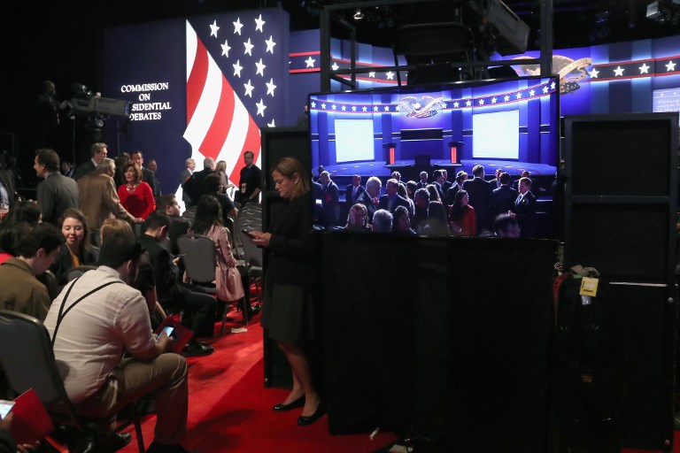 HEMPSTEAD, NY - SEPTEMBER 26: People gather in the audience ahead of the Presidential Debate between Democratic presidential nominee Hillary Clinton and Republican presidential nominee Donald Trump at Hofstra University on September 26, 2016 in Hempstead, New York. The first of four debates for the 2016 Election, three Presidential and one Vice Presidential, is moderated by NBC's Lester Holt.   Spencer Platt/Getty Images/AFP