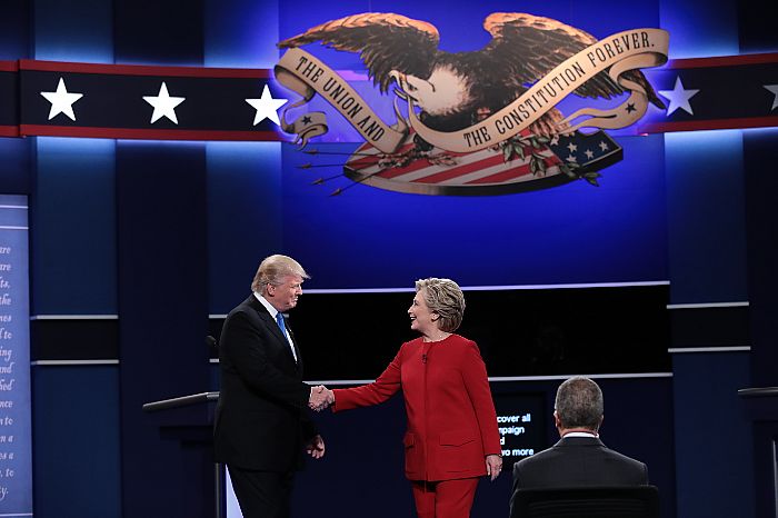 (L-R) Republican presidential nominee Donald Trump and Democratic presidential nominee Hillary Clinton shake hands prior to the start of the Presidential Debate at Hofstra University on September 26, 2016 in Hempstead, New York. The first of four debates for the 2016 Election, three Presidential and one Vice Presidential, is moderated by NBC's Lester Holt.
