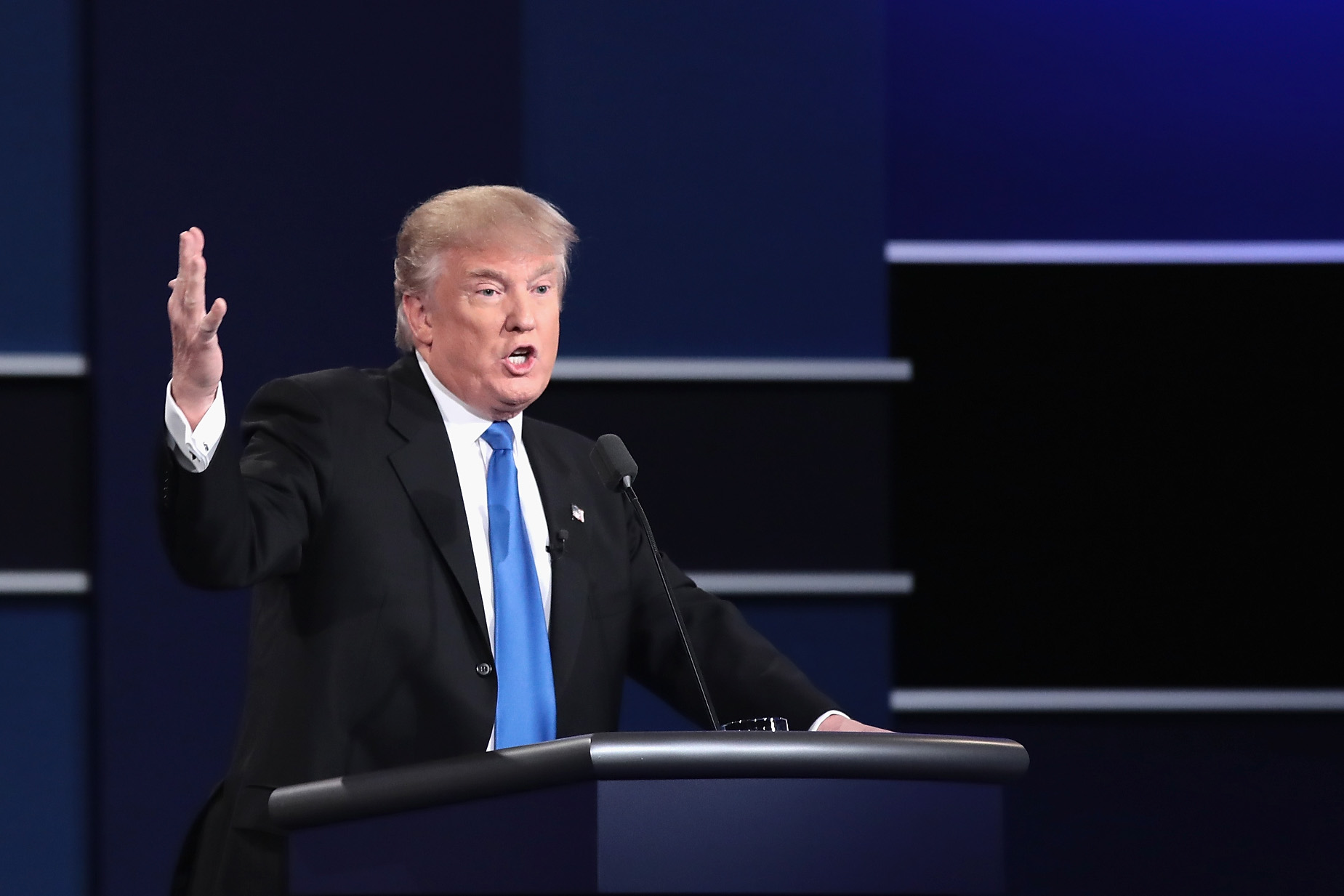 HEMPSTEAD, NY - SEPTEMBER 26: Republican presidential nominee Donald Trump speaks during the Presidential Debate at Hofstra University on September 26, 2016 in Hempstead, New York. The first of four debates for the 2016 Election, three Presidential and one Vice Presidential, is moderated by NBC's Lester Holt. Drew Angerer/Getty Images/AFP