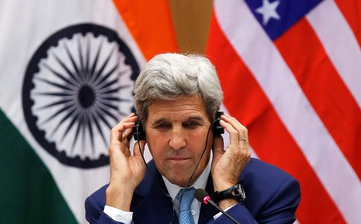 U.S. Secretary of State John Kerry adjusts his ear phones during a joint news conference with India's External Affairs Minister Sushma Swaraj (not pictured) in New Delhi, India, August 30, 2016. REUTERS/Adnan Abidi