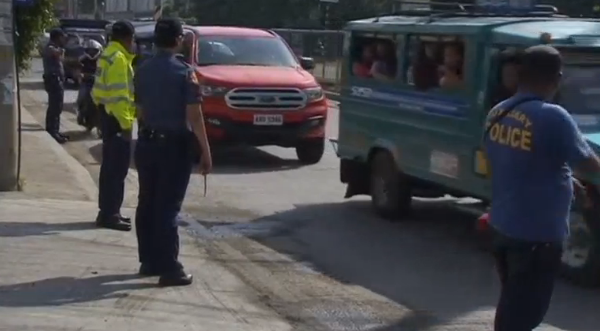 Security is tight in Davao City a few days after a blast at a street market killed 14 people, while relatives of victims cry for justice.  (Photo grabbed from Reuters video)