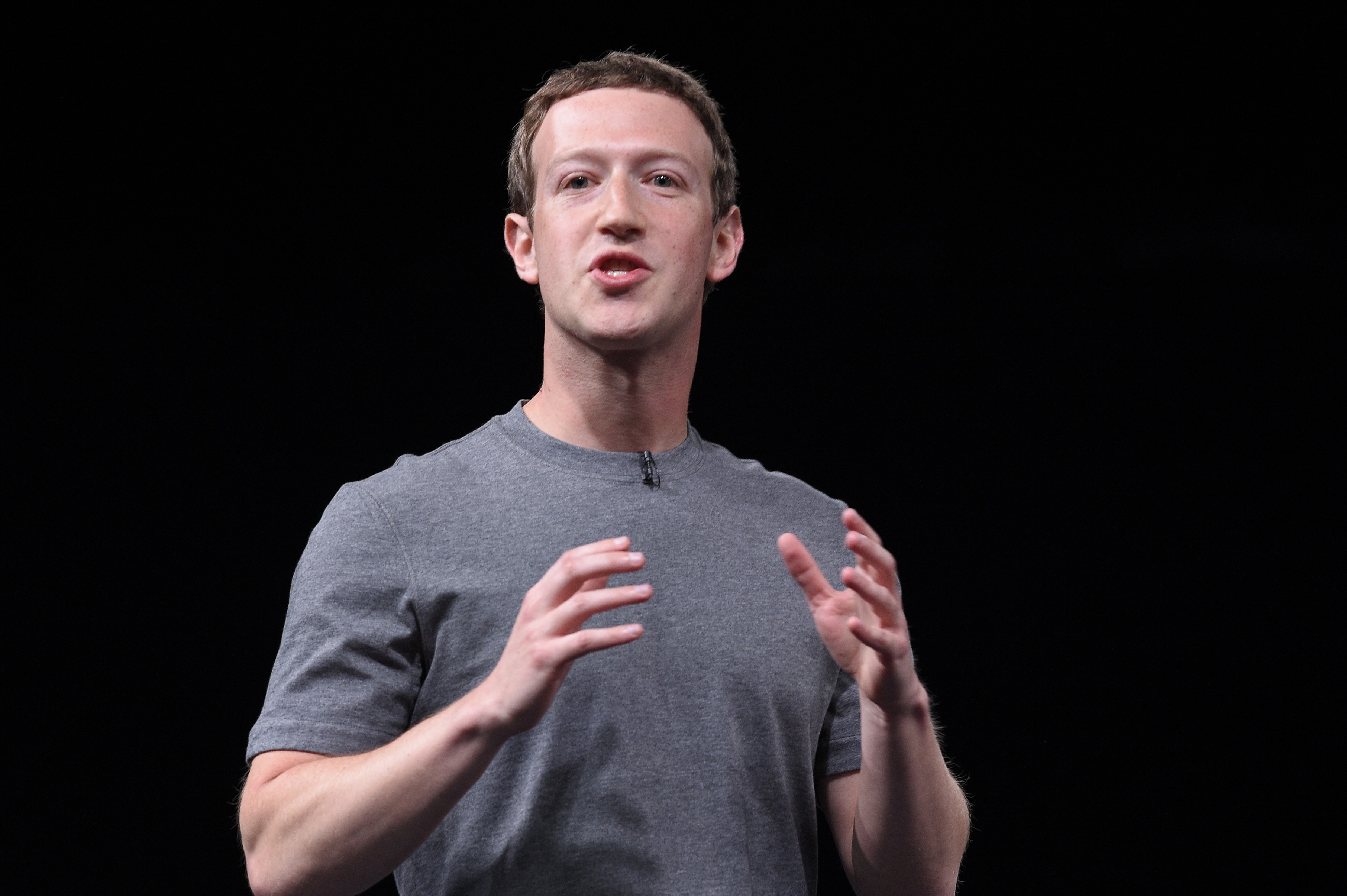 (FILES) This file photo taken on February 21, 2016 shows CEO and co-founder of the social networking website Facebook Mark Zuckerberg speaking during a press conference in Barcelona. Facebook co-founder Mark Zuckerberg and his wife on September 21, 2016 pledged $3 billion over the coming decade on a drive to prevent, cure, or manage every disease in their daughter's lifetime. "This is a big goal," Zuckerberg said at a San Francisco event announcing the next goal of the Chan Zuckerberg Initiative established by the couple. "But we spent the last few years speaking with experts who think it is possible, so we dug in."  / AFP PHOTO / LLUIS GENE
