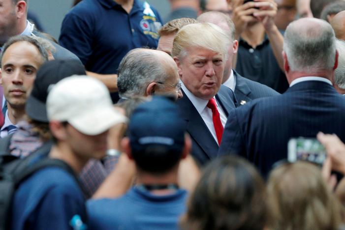 U.S. Republican presidential candidate Donald Trump attends ceremonies to mark the 15th anniversary of the September 11 attacks at the National 9/11 Memorial in New York, New York, United States September 11, 2016. REUTERS/Brian Snyder