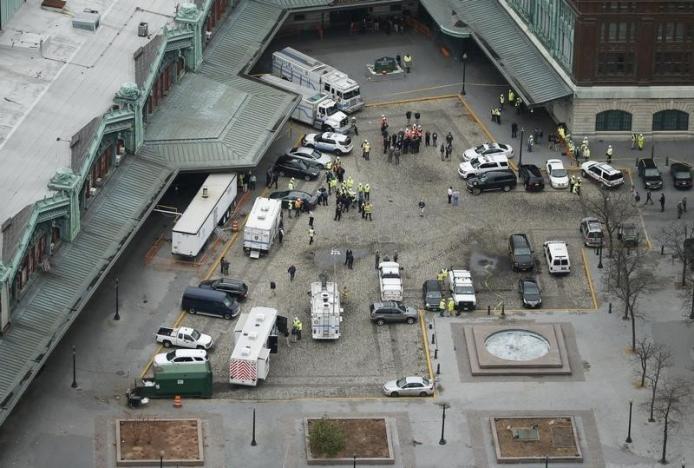 Emergency vehicles are seen in an aerial view outside the New Jersey Transit station following a train derailment and crash in Hoboken, New Jersey, U.S. September 29, 2016. REUTERS/Carlo Allegri