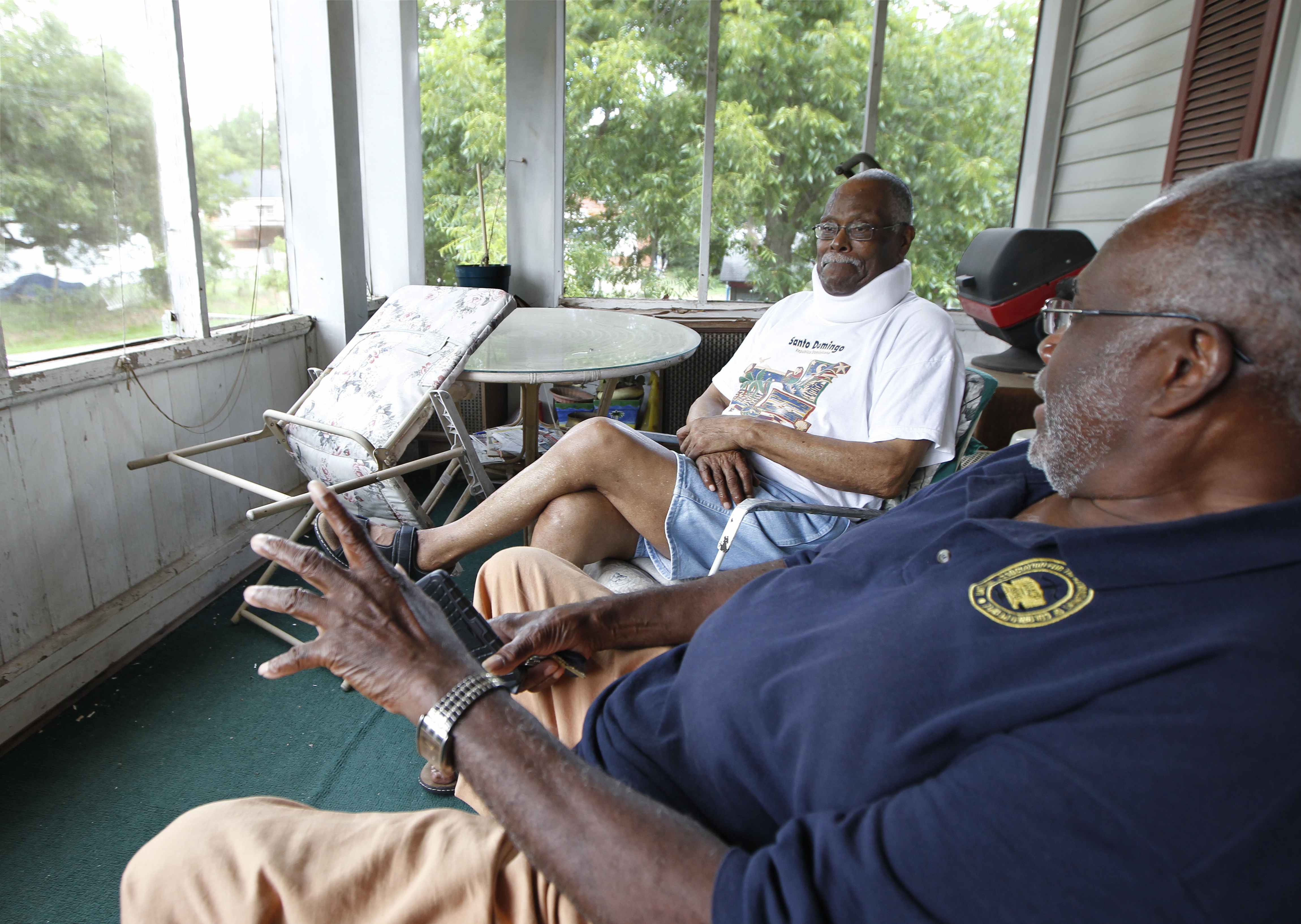Louis Brooks (L), talks with Henry Wilder with the Thomaston-Upson County Branch of the NAACP in the Lincoln Park neighborhood in Thomaston, Georgia, U.S. August 16, 2016. REUTERS/Tami Chappell