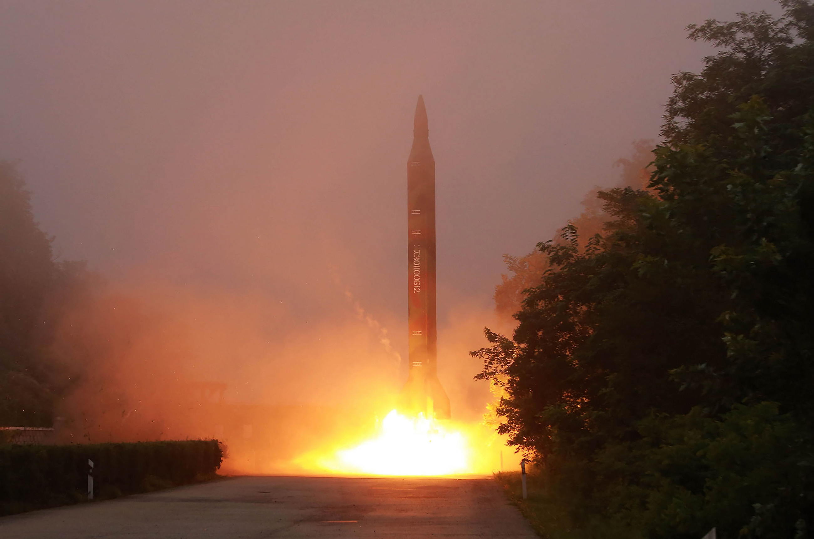 This undated photo released by North Korea's official Korean Central News Agency (KCNA) on July 21, 2016 shows a missile fired during a drill by Hwasong artillery units of the Strategic Force of the Korean People's Army. North Korea said on July 20 its latest ballistic missile tests trialled detonation devices for possible nuclear strikes on US targets in South Korea and were personally monitored by supreme leader Kim Jong-Un. / AFP PHOTO / KCNA VIA KNS / KCNA