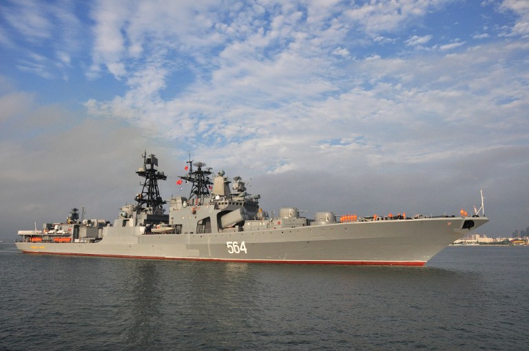 This picture taken on September 12, 2016 shows the Russian destroyer Admiral Tributs arriving at Zhanjiang port in Chinas southern Guangdong province. Russian navy ships arrived for eight-day joint military exercises with the Chinese navy in the South China Sea, in a show of force after an international tribunal invalidated the Asian giant's extensive claims in the region. / AFP PHOTO / STR / China OUT