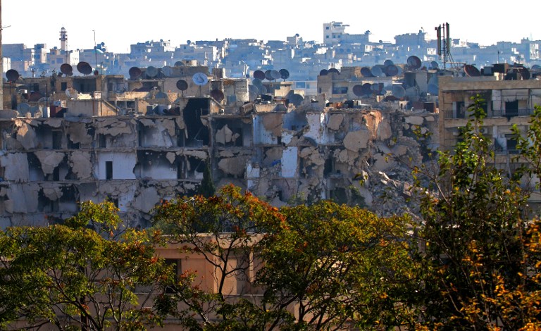 A general view shows destruction in Aleppo's rebel-held Bustan al-Basha neighbourhood on October 6, 2016. "Syrian regime forces advanced from the city centre north into (rebel-held) Bustan al-Basha, and seized a large athletic complex there," the UK-based Syrian Observatory for Human Rights said. This was the first time the regime had entered the district since 2013 and there had been fierce clashes, they added. This was the first time the regime had entered the district since 2013 and there had been fierce clashes, he added.  / AFP PHOTO / GEORGE OURFALIAN