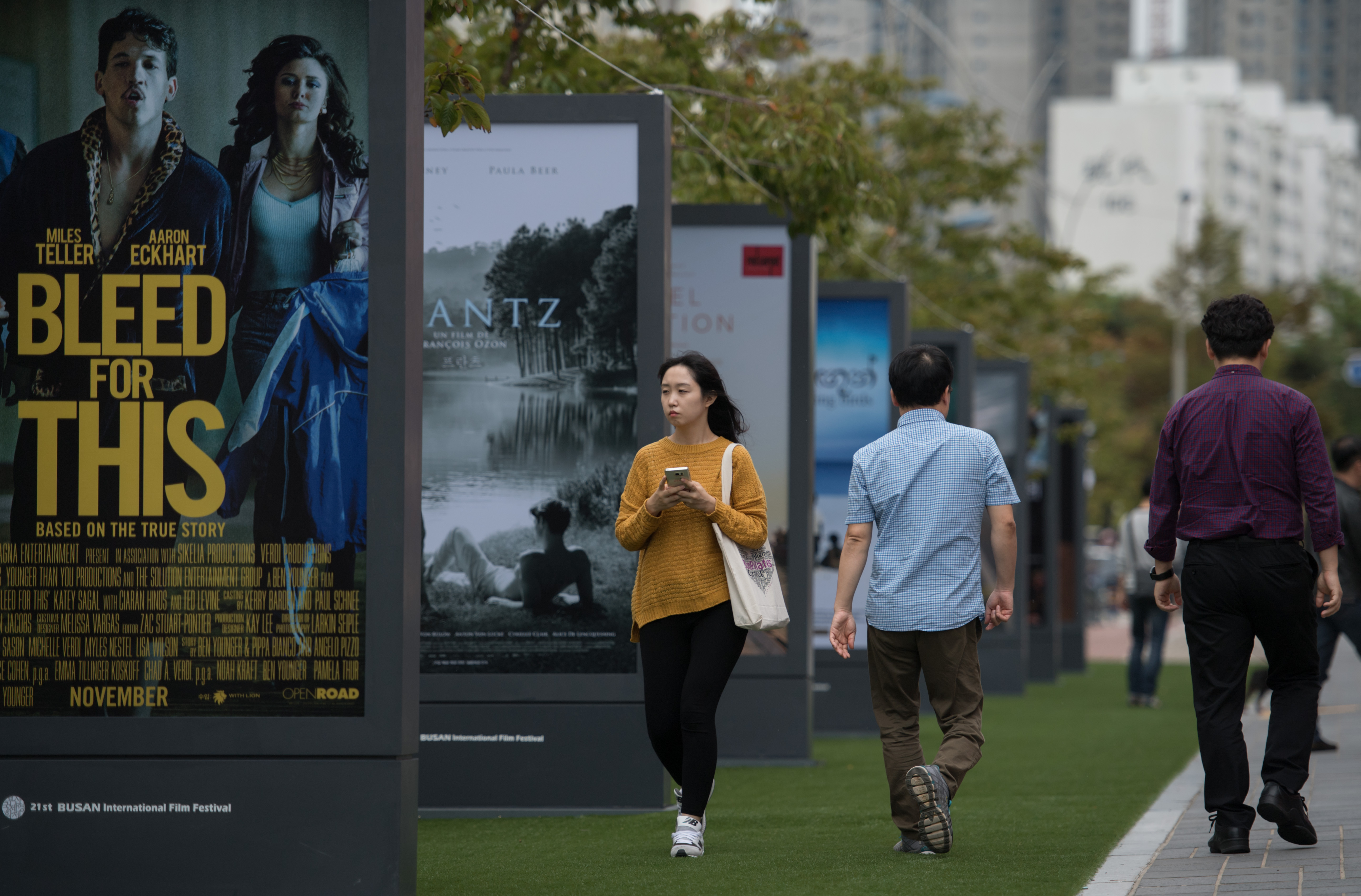 Film posters are displayed during the 21st Busan International Film Festival (BIFF) in Busan on October 7, 2016. The curtain has been raised on a star-studded 21st Busan International Film Festival (BIFF) after two years of political infighting had threatened to derail the premier event of its kind in Asia. / AFP PHOTO / Ed JONES The curtain has been raised on a star-studded 21st Busan International Film Festival (BIFF) after two years of political infighting had threatened to derail the premier event of its kind in Asia. / AFP PHOTO / ED JONES