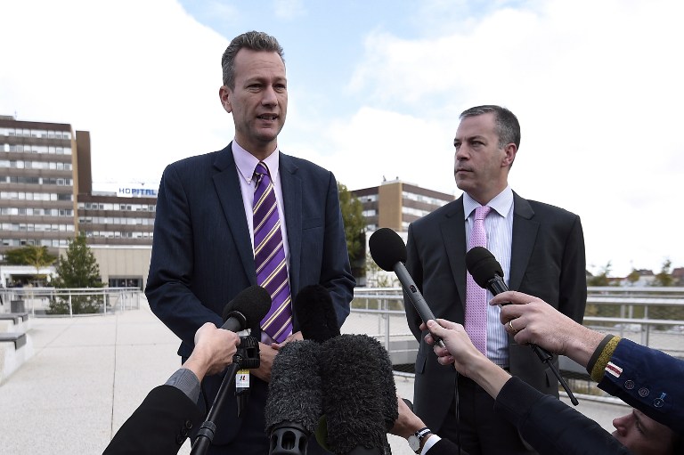 The UK Independence Party's (UKIP) MEP Nathan Gill (C) and UKIP's Director of Communications in Brussels Hermann Kelly (R) give a press conference in front of the Hautepierre hospital in Strasbourg, eastern France, on October 7, 2016 as the favourite to lead the anti-EU UK Independence Party, Steven Woolfe, was recovering in this hospital after an "altercation" at a meeting with colleagues in the European Parliament on October 6. The incident at the parliament in Strasbourg, France, came two days into a leadership contest sparked by UKIP's new leader Diane James's resignation after just 18 days as Farage's successor. / AFP PHOTO / Frederick FLORIN