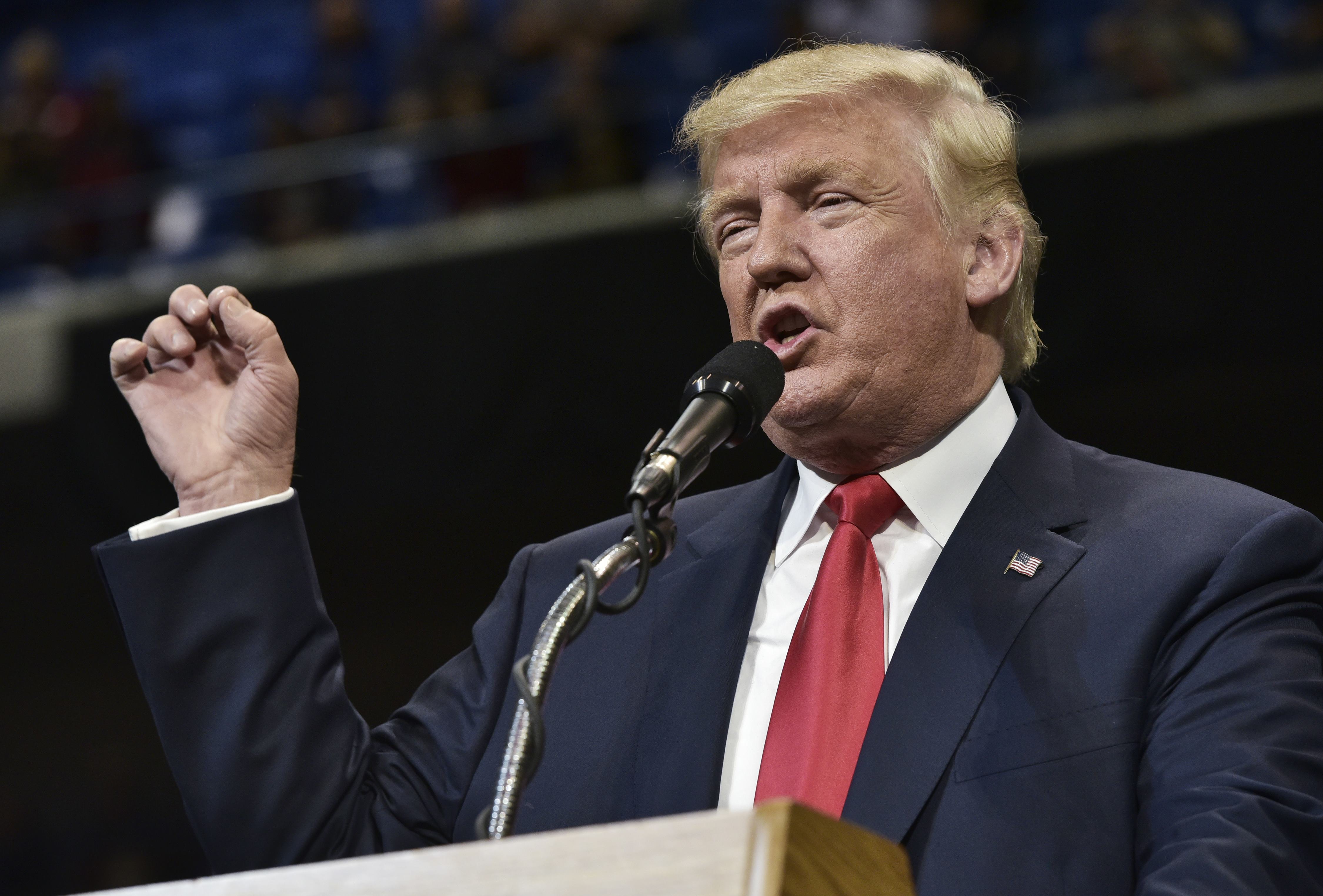 Republican presidential nominee Donald Trump speaks during a rally at Mohegan Sun Arena in Wilkes-Barre, Pennsylvania on October 10, 2016. / AFP PHOTO / MANDEL NGAN