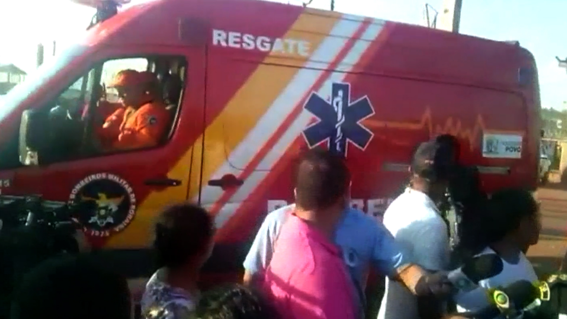 Handout video grab taken from Folha de Boa Vista showing an ambulance outside the Agricola de Monte Cristo prison in Boa Vista, in the Brazilian northern state of Roraima, on October 16, 2016 where at least 10 inmates were killed during clashes between two rival factions. Rioting inmates beheaded their rivals and bodies were burned in an explosion of violence in two Brazilian jails that left at least 18 people dead, authorities said on Monday. Prisoners also took women visitors hostage, a regional official told Brazilian television. It was the latest eruption of gruesome violence to hit the country's underfunded and overcrowded prison system.  / AFP PHOTO / FOLHA DE BOA VISTA / HO / RESTRICTED TO EDITORIAL USE - MANDATORY CREDIT "AFP PHOTO / FOLHA DE BOA VISTA / HO " - NO MARKETING NO ADVERTISING CAMPAIGNS - DISTRIBUTED AS A SERVICE TO CLIENTS - BEST QUALITY AVAILABLE