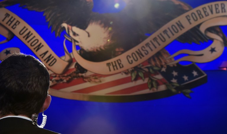 A stand-in tests equipment for the third and final presidential debate between Democratic presidential candidate Hillary Clinton and Republican presidential candidate Donald Trump to be held later tonight at the Thomas & Mack Center on the campus of the University of Nevada, Las Vegas in Las Vegas, Nevada, October 19, 2016. / AFP PHOTO / PAUL J. RICHARDS