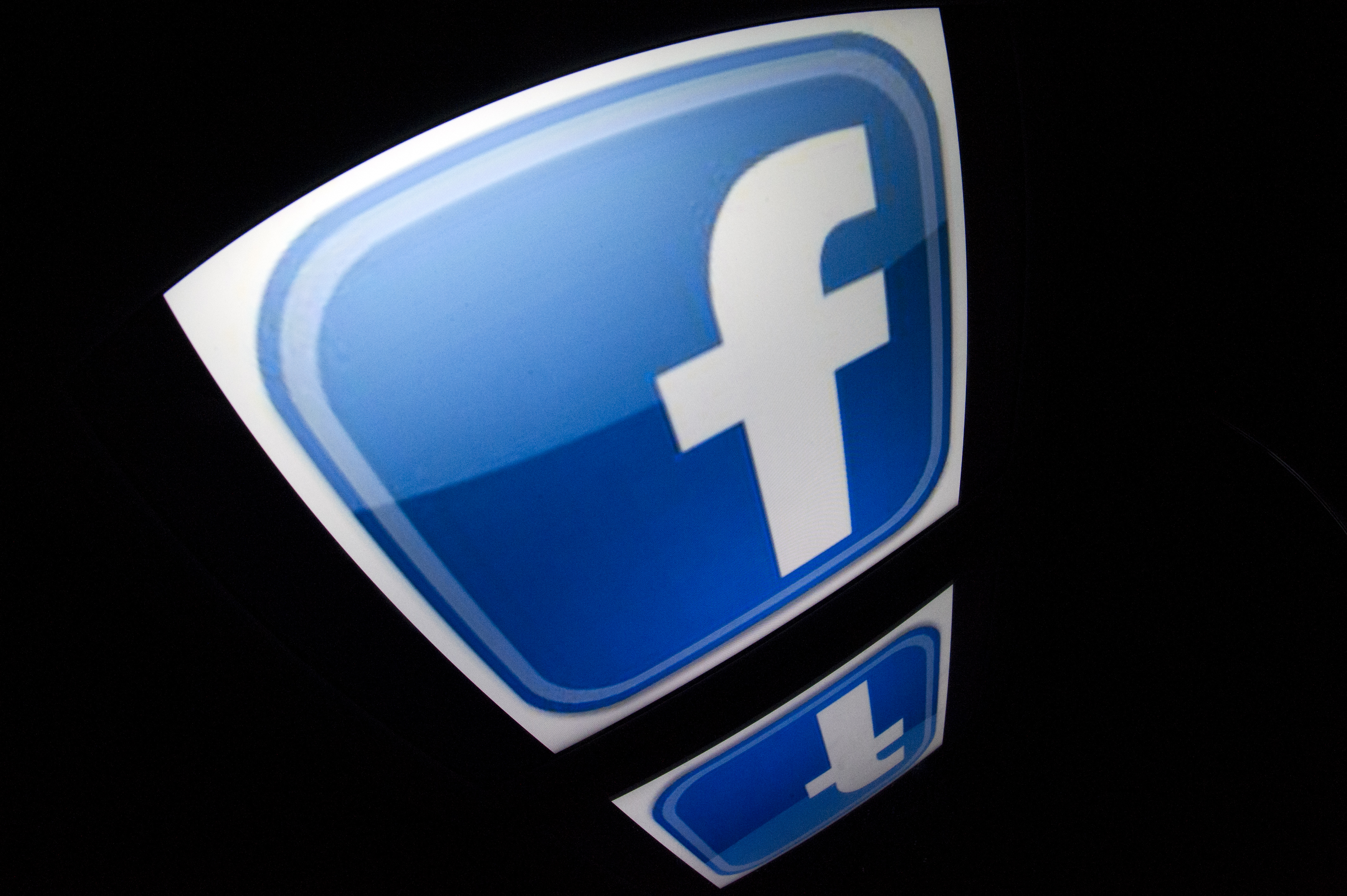 The "Facebook" logo is seen on a tablet screen on December 4, 2012 in Paris. AFP PHOTO / LIONEL BONAVENTURE / AFP PHOTO / LIONEL BONAVENTURE
