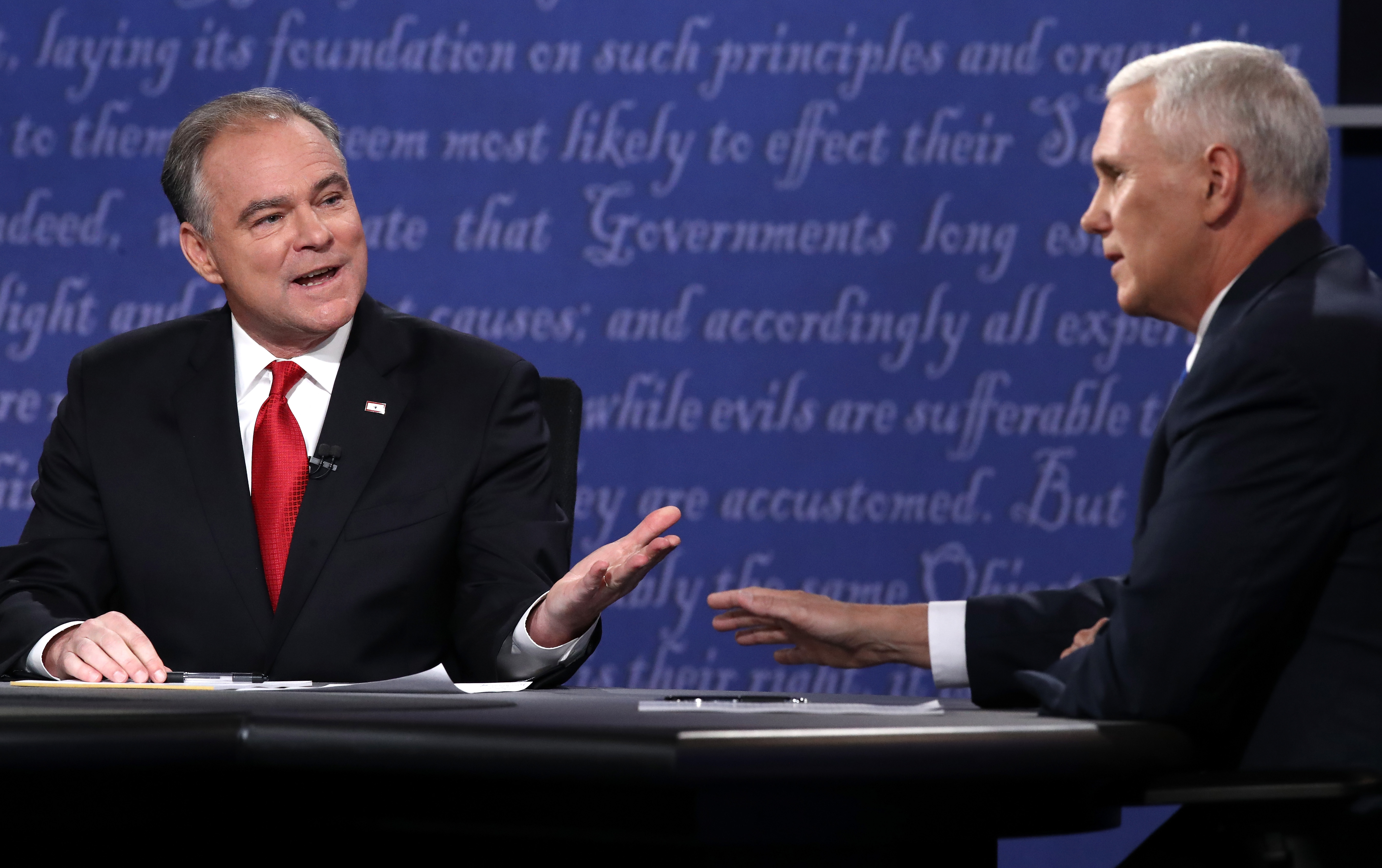 FARMVILLE, VA - OCTOBER 04: Democratic vice presidential nominee Tim Kaine (L) and Republican vice presidential nominee Mike Pence (R) speak during the Vice Presidential Debate at Longwood University on October 4, 2016 in Farmville, Virginia. This is the second of four debates during the presidential election season and the only debate between the vice presidential candidates.   Win McNamee/Getty Images/AFP