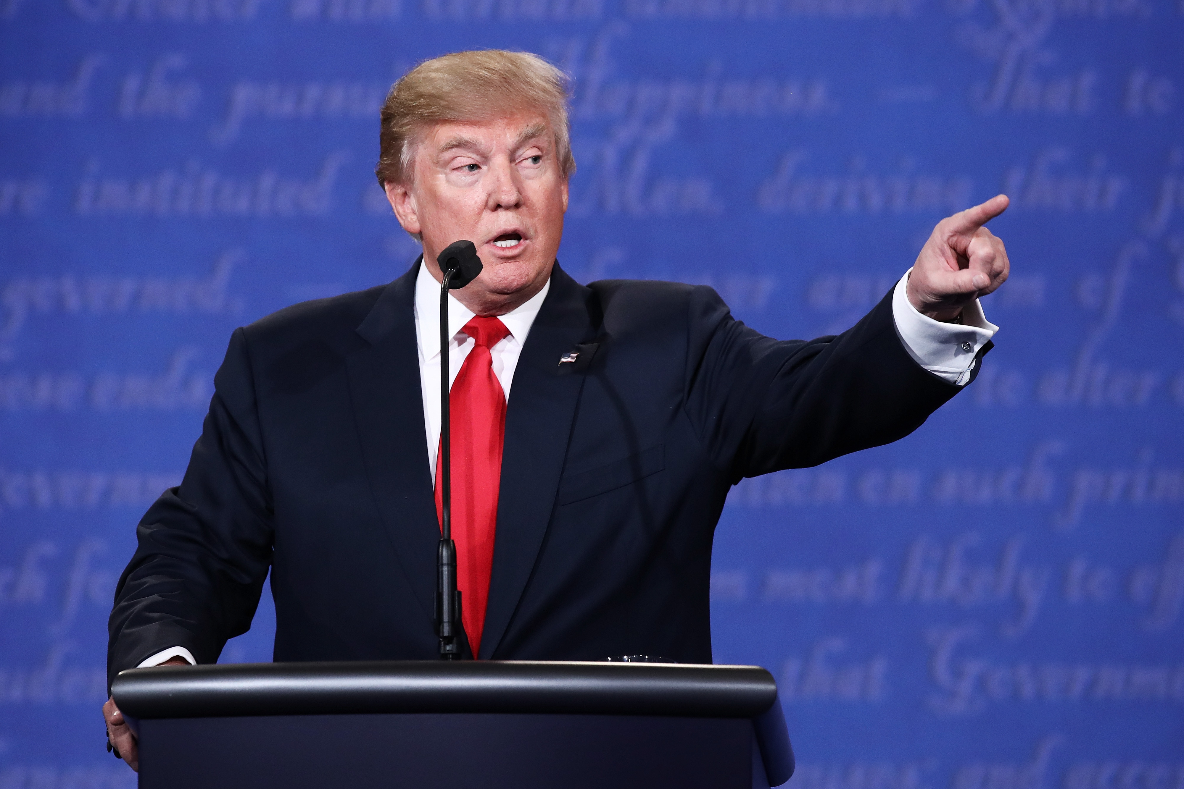 LAS VEGAS, NV - OCTOBER 19: Republican presidential nominee Donald Trump gestures as he speaks during the third U.S. presidential debate at the Thomas & Mack Center on October 19, 2016 in Las Vegas, Nevada. Tonight is the final debate ahead of Election Day on November 8. Win McNamee/Getty Images/AFP