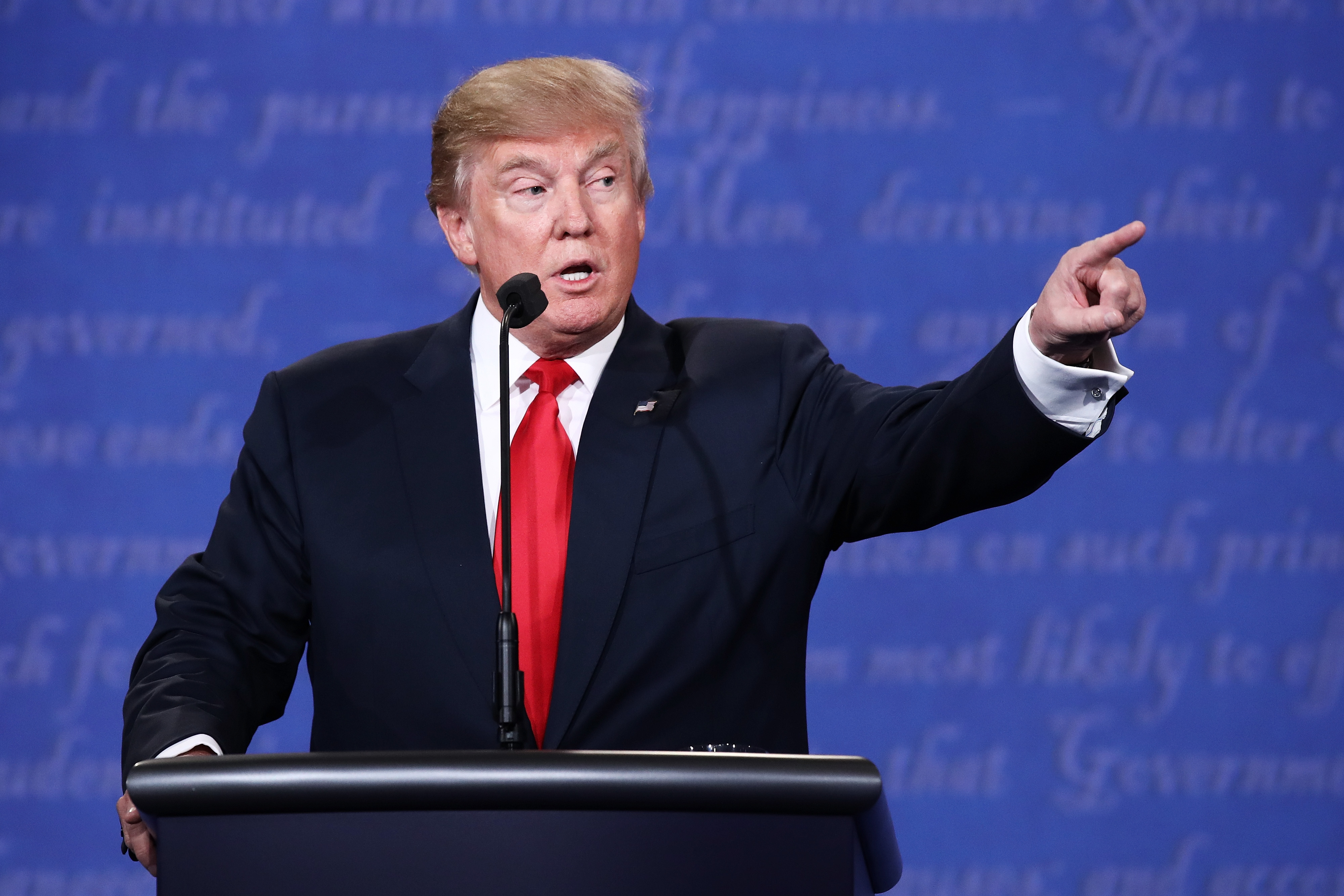 LAS VEGAS, NV - OCTOBER 19: Republican presidential nominee Donald Trump gestures as he speaks during the third U.S. presidential debate at the Thomas & Mack Center on October 19, 2016 in Las Vegas, Nevada. Tonight is the final debate ahead of Election Day on November 8.   Win McNamee/Getty Images/AFP