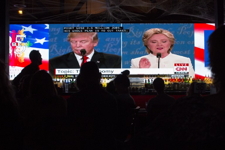 WEST HOLLYWOOD, CA - OCTOBER 19: People at The Abbey bar watch the third and final presidential debate between Republican Donald Trump and Democrat Hillary Clinton on October 19, 2016 in West Hollywood, California. This debate may be the last chance for Trump to catch up to Clinton in the polls before election day, on November 8. David McNew/Getty Images/AFP
