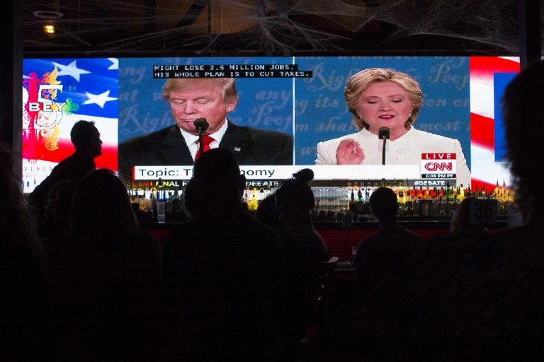 WEST HOLLYWOOD, CA - OCTOBER 19: People at The Abbey bar watch the third and final presidential debate between Republican Donald Trump and Democrat Hillary Clinton on October 19, 2016 in West Hollywood, California. This debate may be the last chance for Trump to catch up to Clinton in the polls before election day, on November 8.   David McNew/Getty Images/AFP
