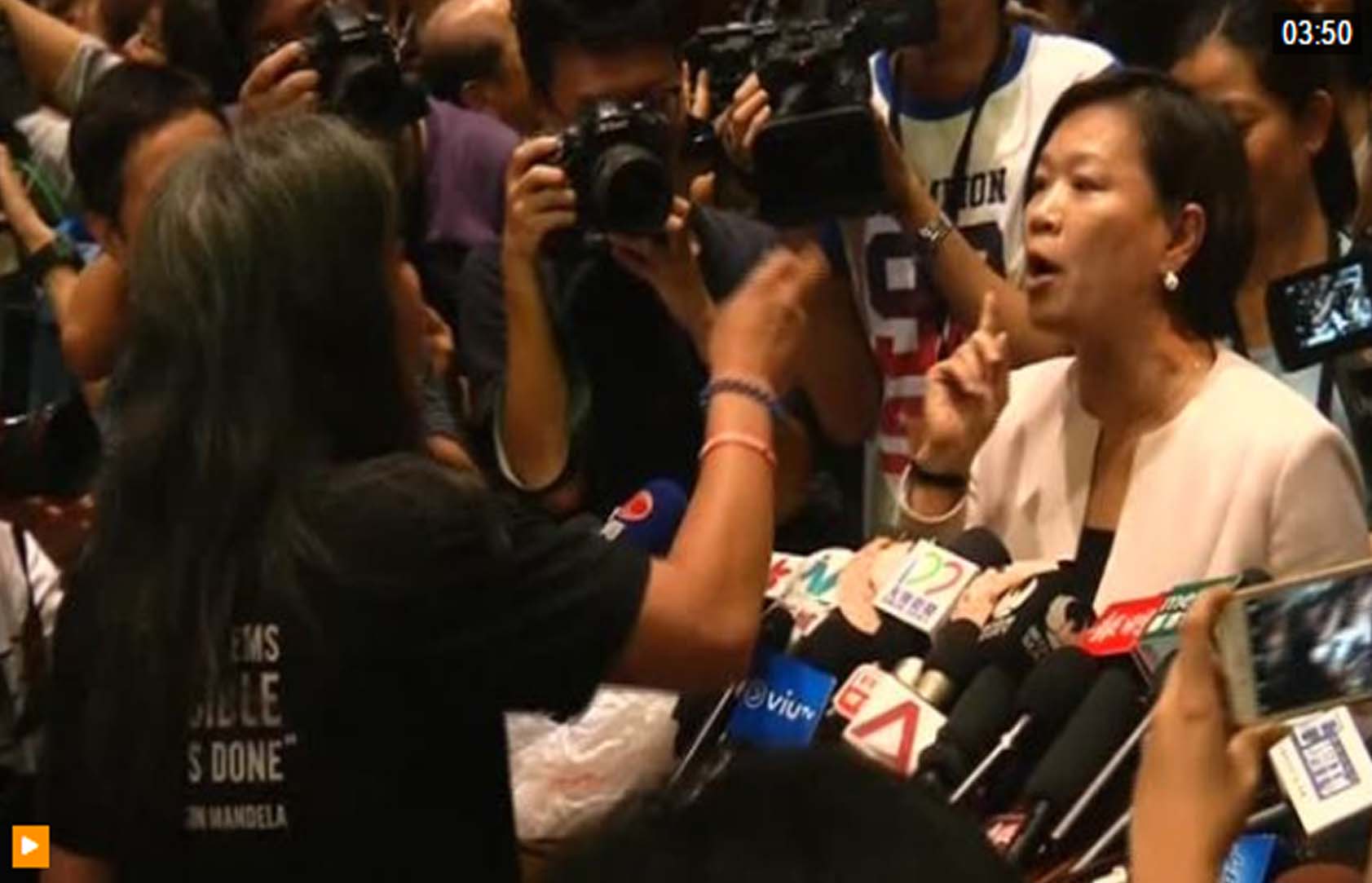 Dozens of pro-Beijing lawmakers boycott the swearing-in of two pro-independence activists in Hong Kong.