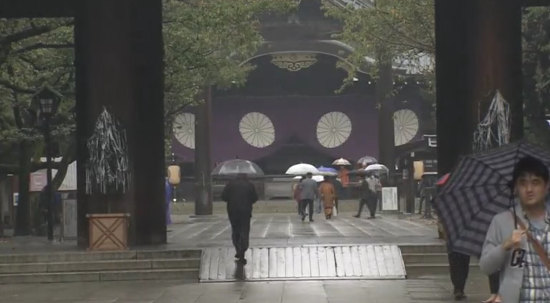 Japanese Prime Minister Shinzo Abe sends ritual offering to the controversial Yasukuni shrine for war dead. ( Photo grabbed from Reuters video )