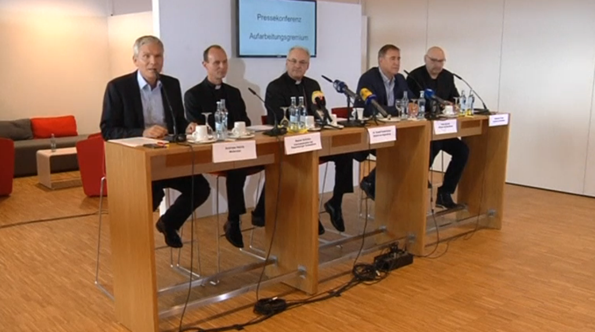 Representatives of the Catholic church and victims of the Regensburg cathedral choir abuse scandal present rehabilitation concept. (Courtesy Reuters/Photo grabbed from Reuters video)