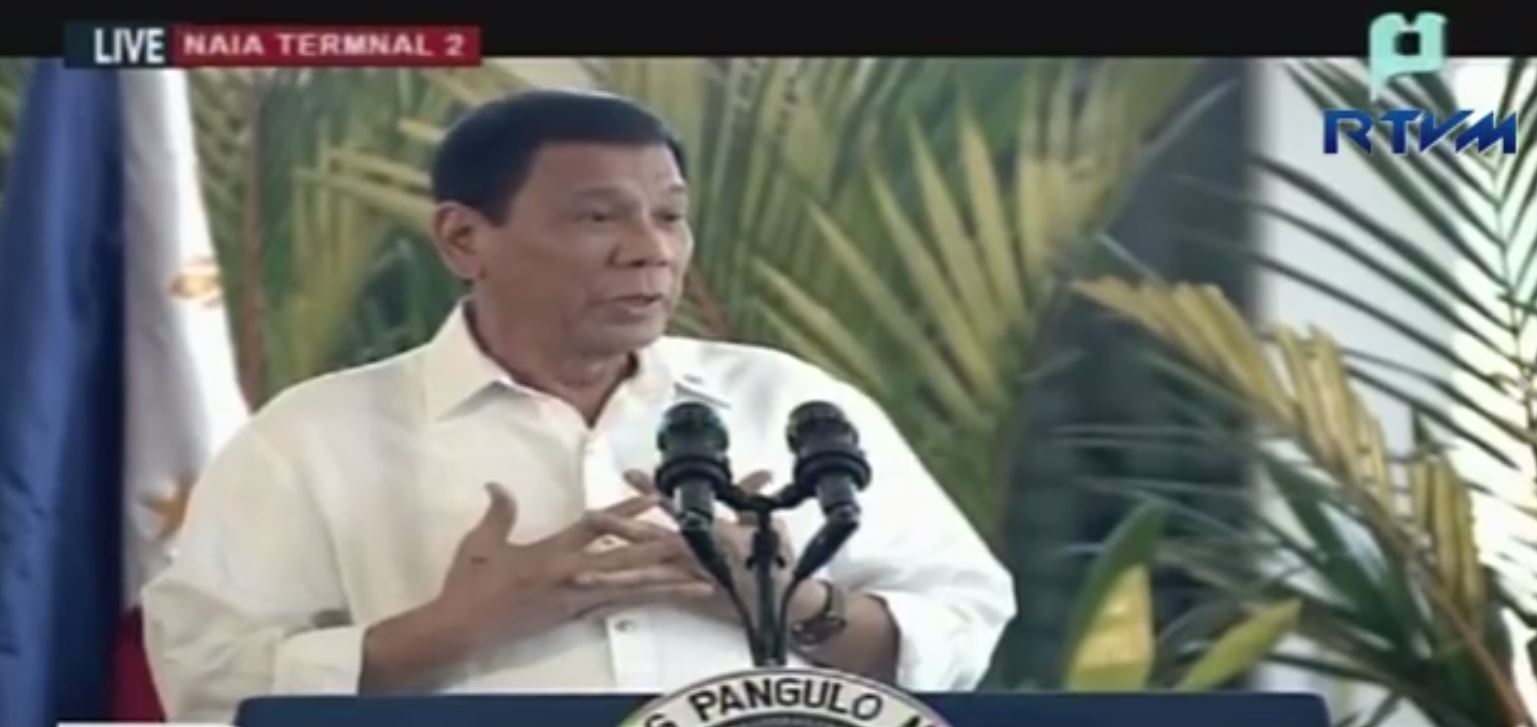 Philippine president Rodrigo Duterte answers questions from the press before flying off for his three-day working visit to Japan. (Photo grabbed from RTVM video)