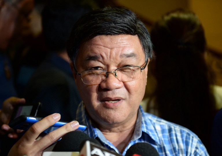 Vitaliano Aguirre, tapped to be the next Philippines' Justice Secretary, speaks to members of the media after meeting President-elect Rodrigo Duterte, at a hotel in Davao City, in southern island of Mindanao on May 18, 2016. / AFP PHOTO / TED ALJIBE