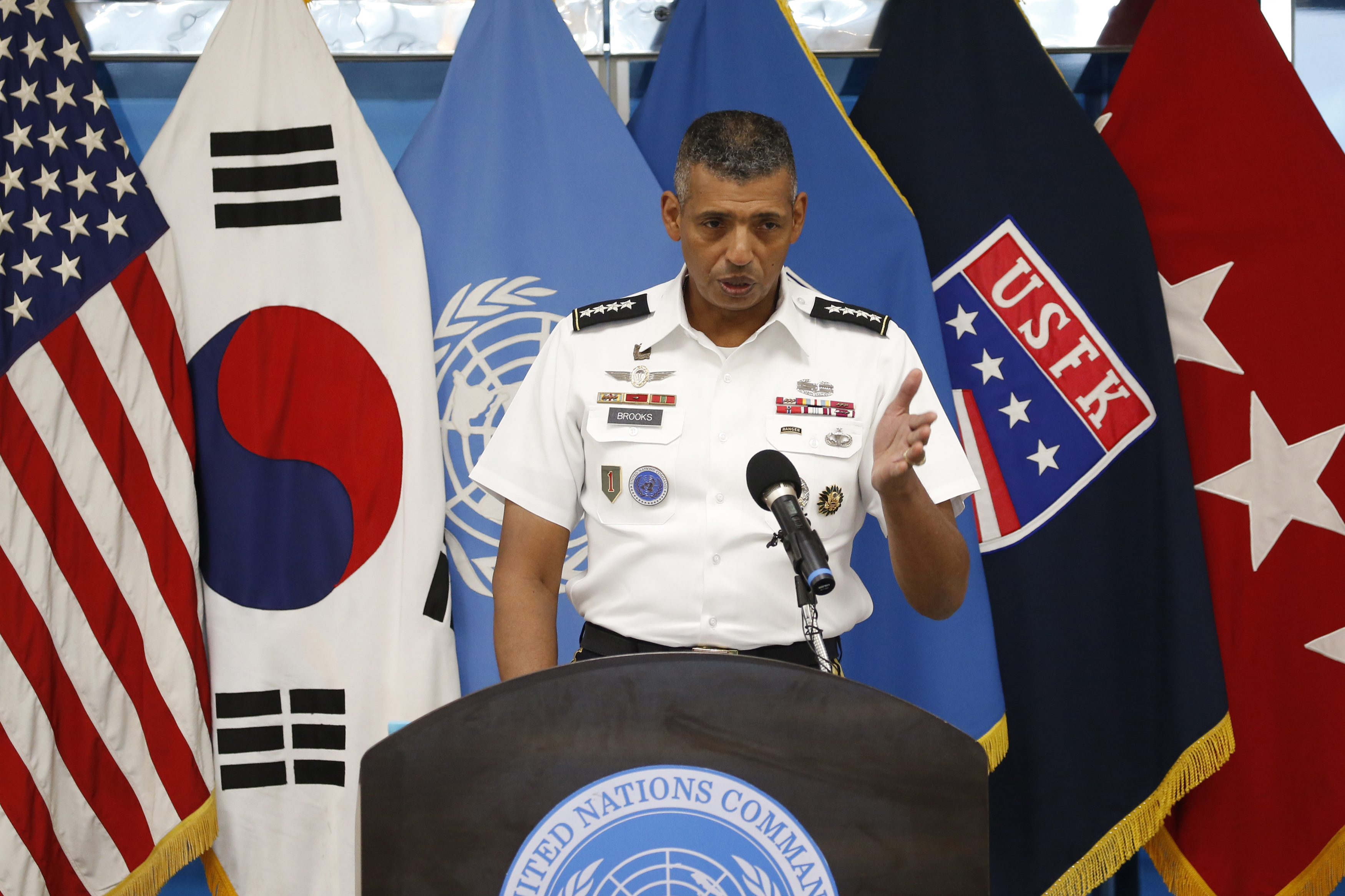 Commander of the United Nations Command, Combined Forces Command, and United States Forces Korea, General Vincent K. Brooks, speaks during a ceremony marking the 63rd anniversary of the signing of the Korean War ceasefire armistice agreement at the truce village of Panmunjom, along the Demilitarized Zone (DMZ) on July 27, 2016. The armistice agreement on July 27, 1953 brought three years of active combat in the Korean War to a halt, but the two Koreas are still technically at war as no formal peace treaty was signed. / AFP PHOTO / POOL / KIM HONG-JI
