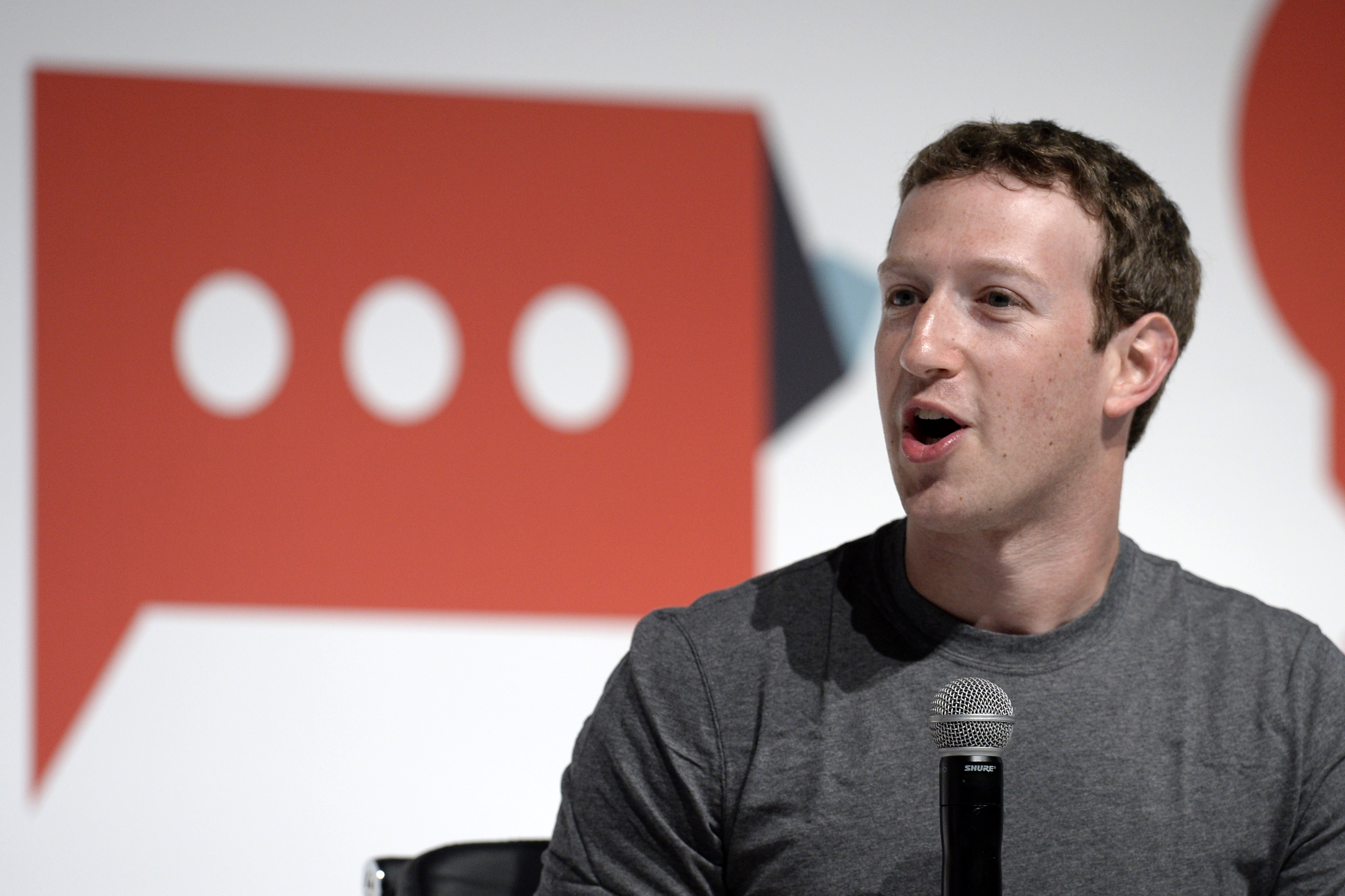 (FILES) This file photo taken on March 2, 2015 shows Facebook's creator Mark Zuckerberg speaks on the opening day of the 2015 Mobile World Congress (MWC) in Barcelona. The State prosecutor's office in Munich has initiated an investigation against Facebook's managers for causing incitement of the people according to Der Spiegel magazine on November 4, 2016 in advance from its new issue. / AFP PHOTO / LLUIS GENE