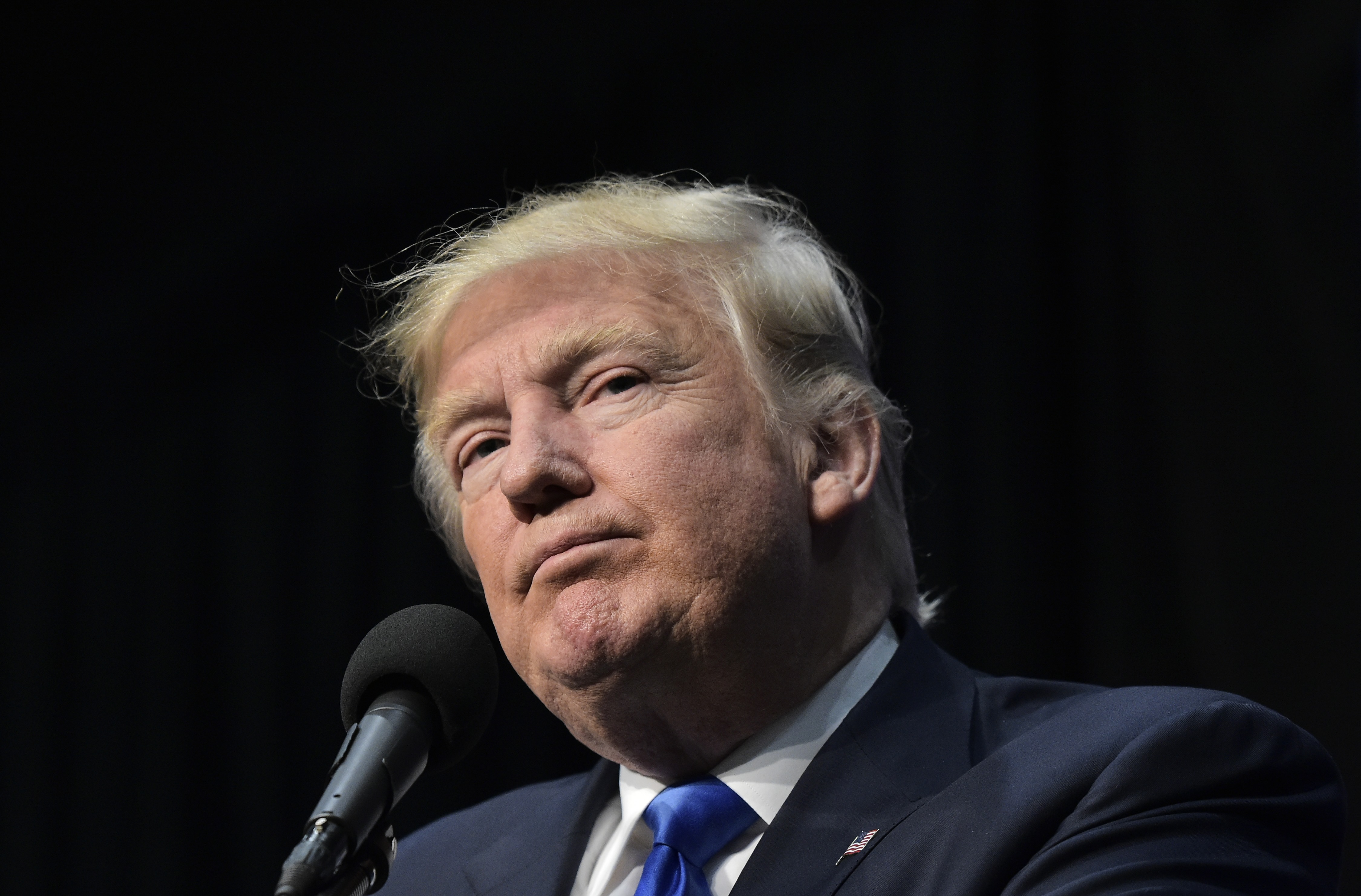 Republican presidential nominee Donald Trump speaks during a rally at the Sioux City Convention Center in Sioux City, Iowa on November 6, 2016. Donald Trump barnstorms five states Sunday while Hillary Clinton implores her most fervent supporters to get to the polls, in a frenetic final 48-hour dash to the US presidential election. / AFP PHOTO / Mandel NGAN