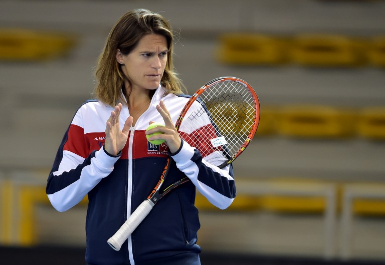 France's Fed Cup team coach Amelie Mauresmo gives instructions during a practice session, on November 8, 2016 in Strasbourg, eastern France, ahead of the Fed Cup final against the Czech Republic.    / AFP PHOTO / PATRICK HERTZOG