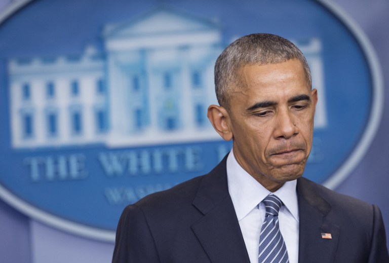 US President Barack Obama speaks during a press conference in the Brady Press Briefing Room of the White House in Washington, DC, November 14, 2016. US President Barack Obama said Monday that America must continue to be a "beacon of hope" as the world goes through a period of great change. / AFP PHOTO / SAUL LOEB