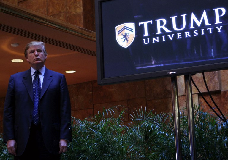 (files) This May 23, 2005, file photo shows real estate mogul Donald Trump holding a media conference to announce the establishment of Trump University in New York City.  Trump is close to reaching a $20 million settlement to end two class-action lawsuits accusing his Trump University of having been a fraud, a source close to the case said on November 18. 2016. / AFP PHOTO / GETTY IMAGES NORTH AMERICA / Thos Robinson