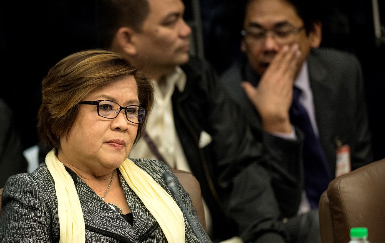 Senator Leila De Lima attends the Senate drug hearing at the Senate building in Manila on November 23, 2016.  Kerwin Espinosa, son of the late mayor Rolando Espinosa, was arrested in the United Arab Emirates last month and will face drug trafficking charges. / AFP PHOTO / NOEL CELIS