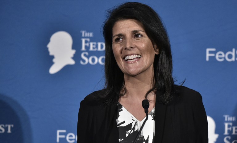 (FILES) This file photo taken on November 18, 2016 shows South Carolina Governor Nikki Haley during the 2016 National Lawyers Convention sponsored by the Federalist Society in Washington, DC. President-elect Donald Trump has tapped South Carolina Governor Nikki Haley to be his ambassador to the United Nations, US media reported November 23, 2016. The Republican rising star has accepted the offer, The Washington Post cited a source familiar with Trump's transition process as saying. The daughter of Indian immigrants, Haley, 44, is the first woman Trump has nominated to his cabinet. / AFP PHOTO / Mandel Ngan
