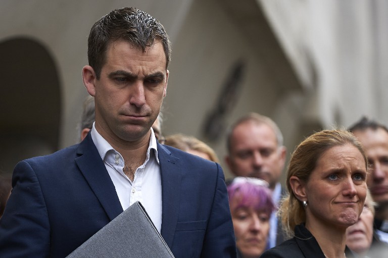 Widower of murdered Labour MP Jo Cox, Brendan Cox (L) and Jo's sister Kim Leadbeater (R) react  outside the Old Bailey criminal court in London on November 23, 2016, following the conviction of Jo's killer Thomas Mair. A far-right extremist Thomas Mair was Wednesday sentenced to life imprisonment without the possibility of release for murdering British MP Jo Cox a week before the European Union referendum in a "politically motivated" attack. / AFP PHOTO / NIKLAS HALLE'N