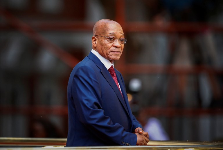 (FILES) This file photo taken on February 12, 2015 shows South African president, Jacob Zuma, arriving for the formal opening of parliament in Cape Town. At least three South African ministers have called for President Jacob Zuma to resign, local media reported on November 28, 2016, in the most serious challenge to his leadership since he took power in 2009. The News24 news agency, citing sources in the ruling ANC party, said that Tourism Minister Derek Hanekom, Health Minister Aaron Motsoaledi and Public Works Minister Thulas Nxesi had called on Zuma to step down. / AFP PHOTO / POOL / nic BOTHMA