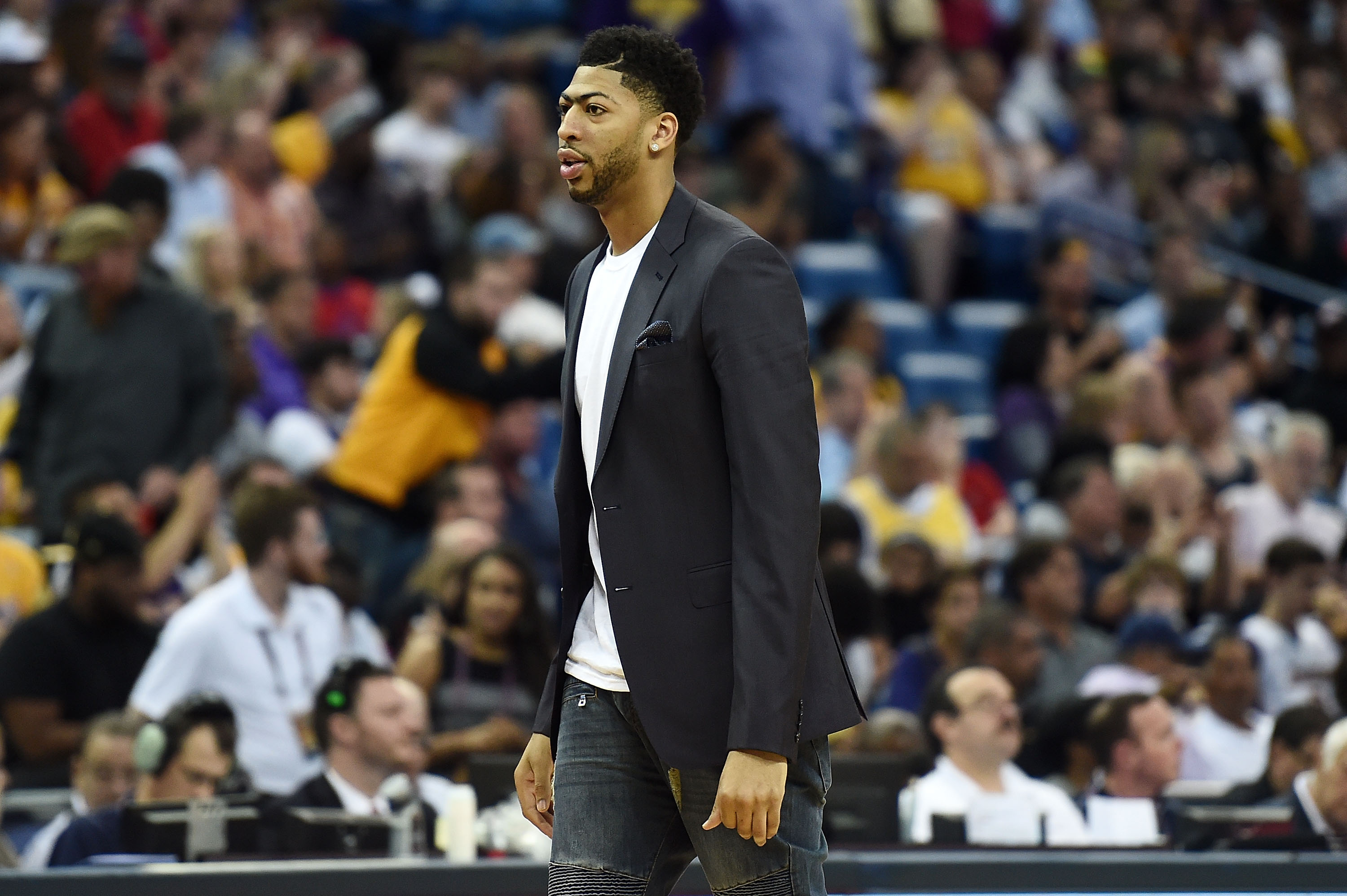 NEW ORLEANS, LA - APRIL 08: Anthony Davis #23 of the New Orleans Pelicans watches action during a game against the Los Angeles Lakers at the Smoothie King Center on April 8, 2016 in New Orleans, Louisiana. NOTE TO USER: User expressly acknowledges and agrees that, by downloading and or using this photograph, User is consenting to the terms and conditions of the Getty Images License Agreement.   Stacy Revere/Getty Images/AFP