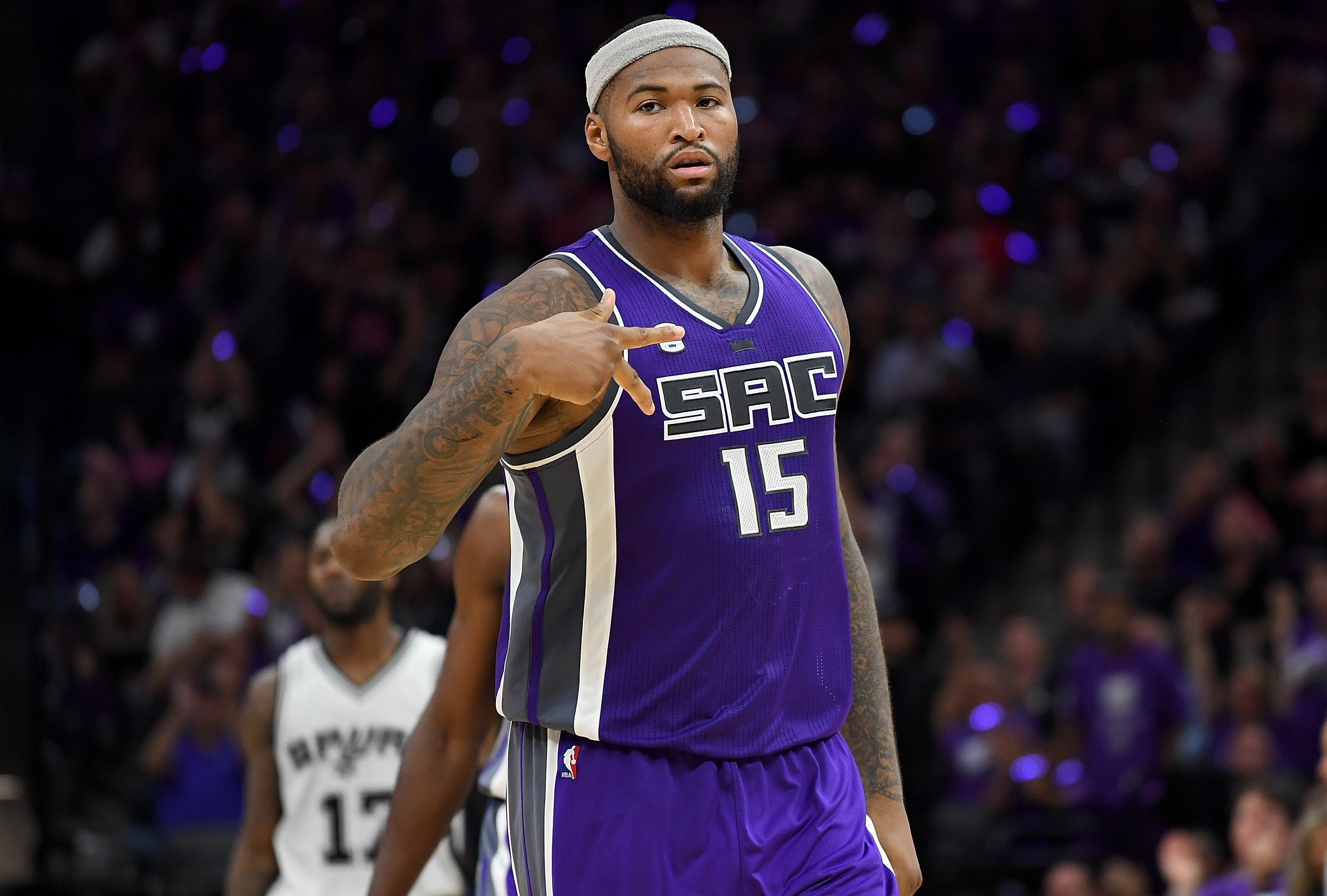SACRAMENTO, CA - OCTOBER 27: DeMarcus Cousins #15 of the Sacramento Kings reacts after making a three-point shot against the San Antonio Spurs during the third quarter of an NBA basketball game at Golden 1 Center on October 27, 2016 in Sacramento, California. NOTE TO USER: User expressly acknowledges and agrees that, by downloading and or using this photograph, User is consenting to the terms and conditions of the Getty Images License Agreement.   Thearon W. Henderson/Getty Images/AFP
